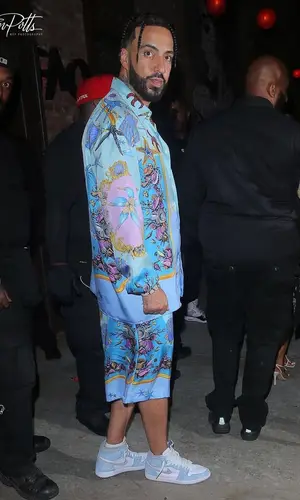 French Montana wearing Versace shirt