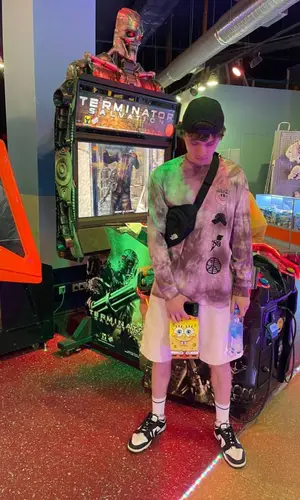 John However wearing McDonald's Merch other