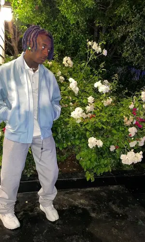 Lil Uzi Vert wearing Louis Vuitton jacket