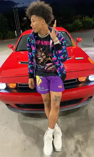 Mikey wearing Bape hoody