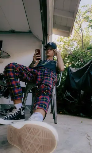 Jxdn wearing New Era cap