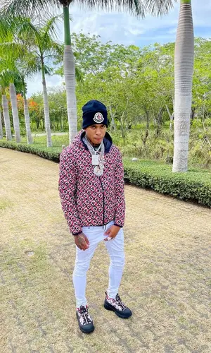 NLE Choppa wearing Moncler hat