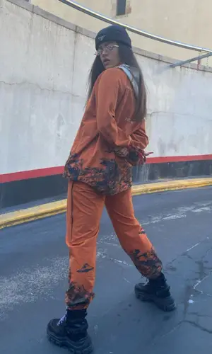 Rosalia wearing Undercover pants