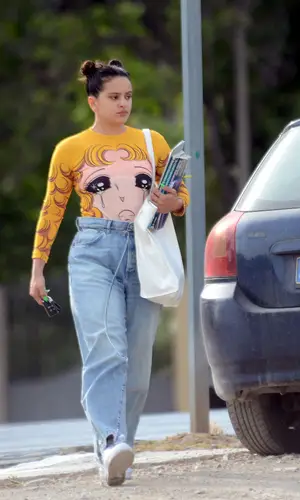 Rosalia wearing Telfar bag