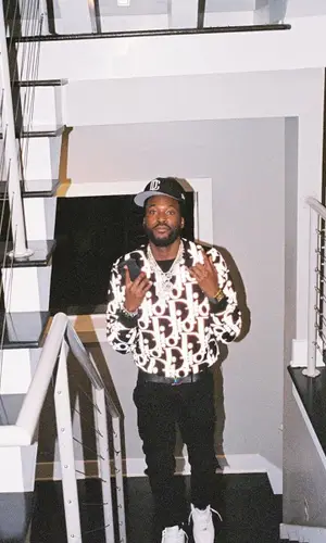 Meek Mill wearing Dior sweater