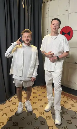 Джарахов wearing Prada sneakers