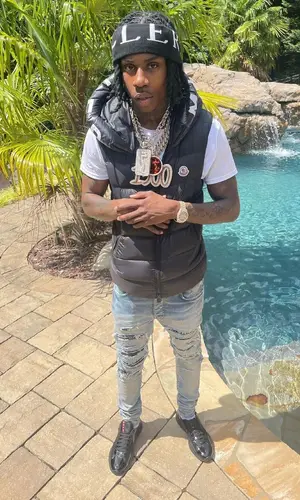 Polo G wearing Moncler hat