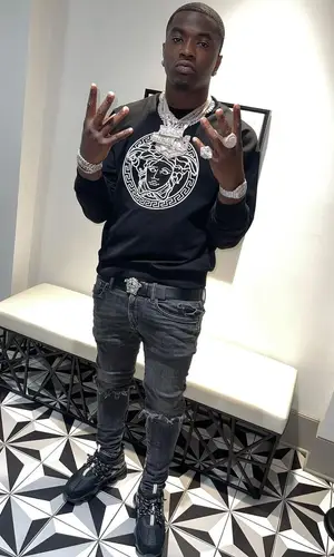 Bankroll Freddie wearing Versace belt