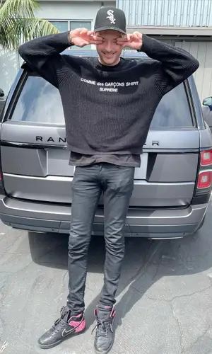 G-Eazy wearing Nike sneakers