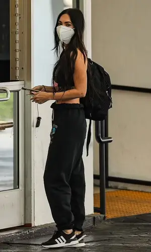 Megan Fox’s Outfit in Nike Top, Boys Lie Pants & Adidas Sneakers (2021)