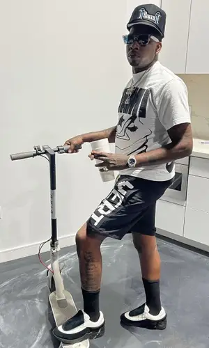 Lil Duke wearing Dior eyewear
