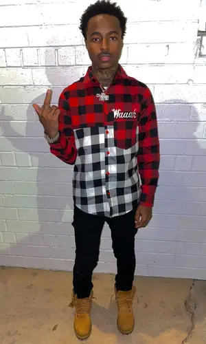Popp Hunna wearing Valabasas jeans