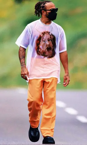 Lewis Hamilton wearing Burberry trousers