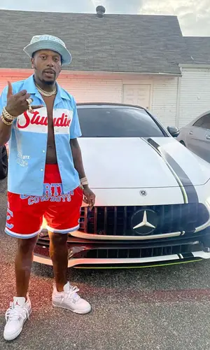 Sauce Walka wearing 2828 Studios hat
