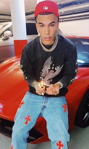 Sfera Ebbasta wearing Paura sweatshirt