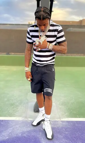 CJ So Cool wearing Balenciaga sock