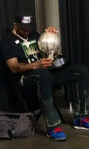 PJ Tucker wearing Milwaukee Bucks t-shirt