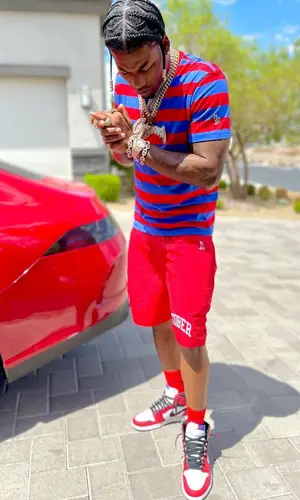 CJ So Cool wearing Balenciaga sock