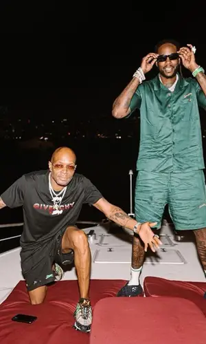 2 Chainz wearing Jon Stan cap