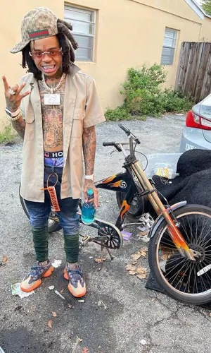 SpotemGottem wearing Hard Soda jeans