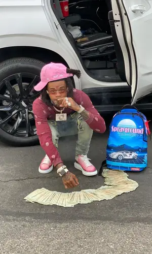 SpotemGottem wearing Serenede jeans