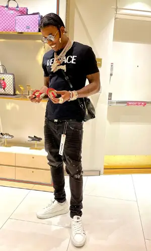 CJ So Cool wearing Gucci bag