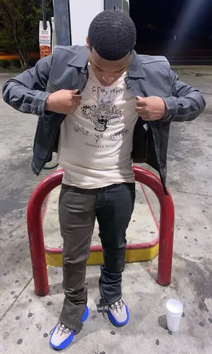 Fast Cash Jizzle wearing Gentry Garb jacket