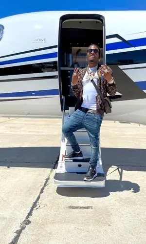 CJ So Cool wearing Louis Vuitton bag
