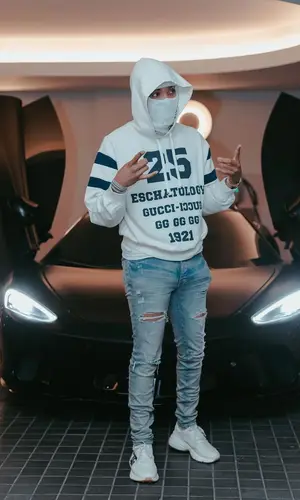 G Herbo wearing Gucci sweatshirt