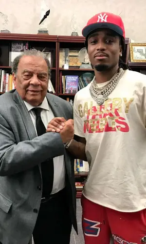 Quavo wearing New Era cap