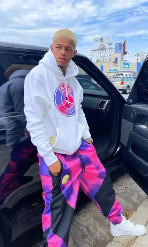 YK Osiris wearing Jordan hoody