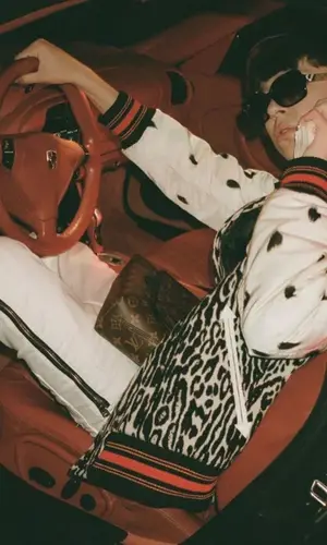 Молодой Платон wearing Amiri pants
