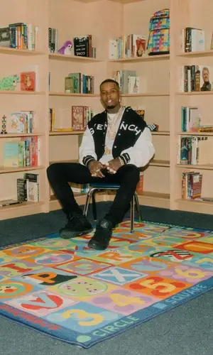 Tory Lanez wearing Amiri jeans