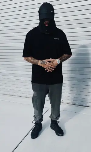 Rauw Alejandro wearing Balenciaga t-shirt