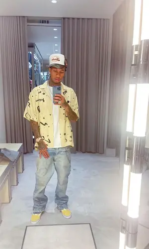Tyga wearing Jacquemus shirt