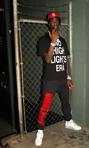 Yung Mal wearing New Era cap