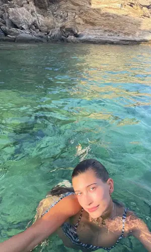 Hailey Bieber wearing The Attico swimwear