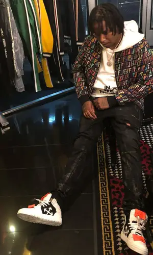Ballout wearing Fendi jacket