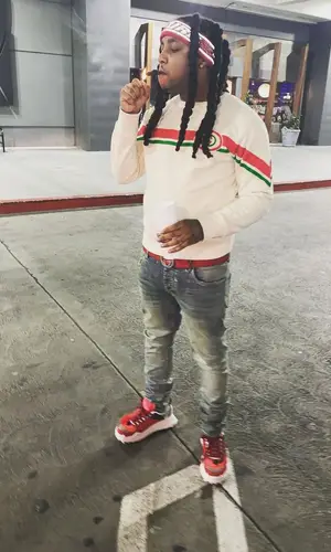 Tadoe wearing Off-White sneakers