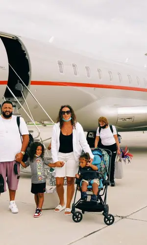 DJ Khaled wearing Louis Vuitton bag