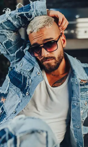 Maluma wearing Heron Preston jacket