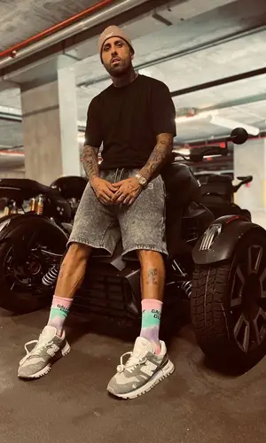 Nicky Jam wearing Kith hat