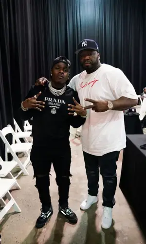 DaBaby wearing Amiri jeans