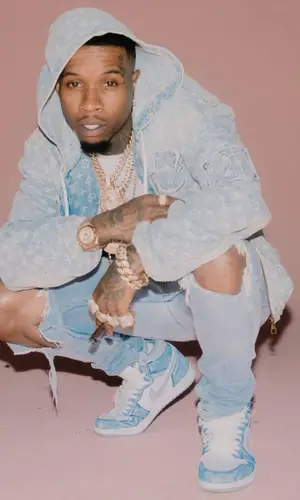 Tory Lanez wearing Louis Vuitton hoody