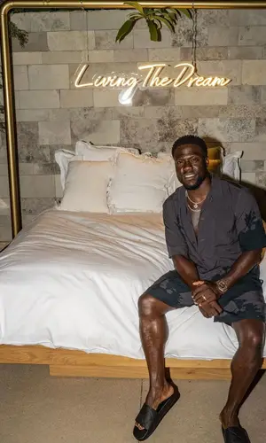 Kevin Hart wearing Dries Van Noten shirt