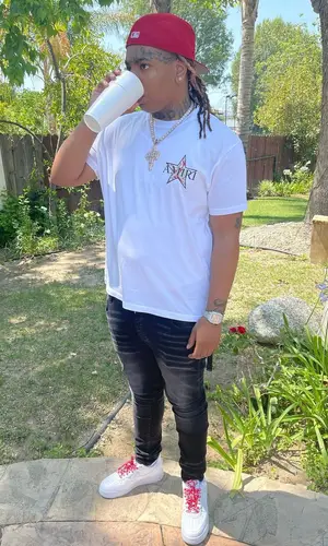 Lil Gotit wearing Amiri t-shirt