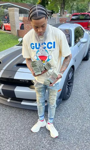 Lil Migo wearing Gucci sock