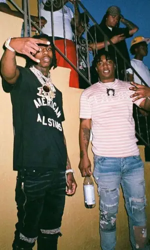 Fredo Bang wearing Louis Vuitton belt