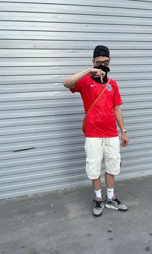 Obladaet wearing Prada eyewear