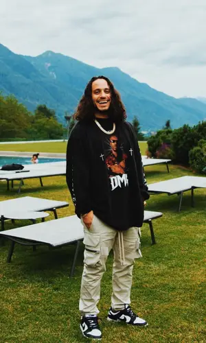 Russ wearing Yeezy sweatshirt